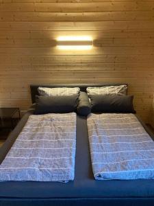 En eller flere senger på et rom på Ferienhaus Vogelnest
