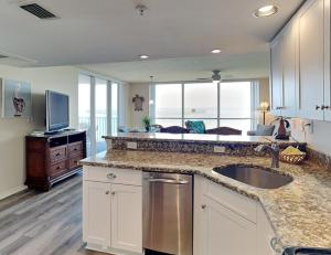 a kitchen with a sink and a counter top at Lovers Key Resort 1105 - 1 Bedroom - Sleeps 4 in Fort Myers Beach