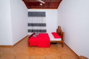 Voodi või voodid majutusasutuse East Gate 8-9 Batticaloa toas