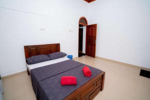 Postel nebo postele na pokoji v ubytování East Gate 8-9 Batticaloa