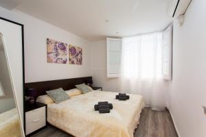 Postel nebo postele na pokoji v ubytování Key Gracia Apartments