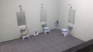 a bathroom with two toilets and two sinks at New Togakushi Sea Hail - Vacation STAY 47754v in Nagano