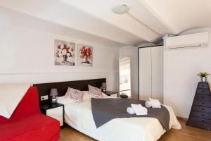 Postel nebo postele na pokoji v ubytování Key Gracia Apartments