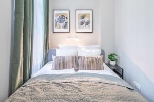 Postel nebo postele na pokoji v ubytování Central New Cozy