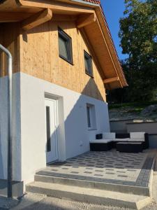 a building with a door and a patio at Ferienwohnung Felina in Passau