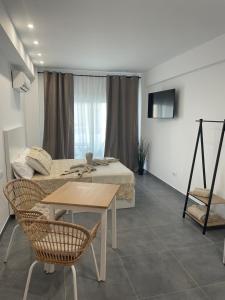 Μια τηλεόραση ή/και κέντρο ψυχαγωγίας στο 2loft moderno acogedor centrico y silencioso