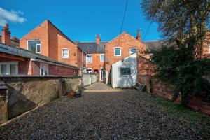 an empty alley in a brick building at Fliss's House in Leicester