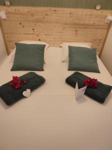 Llit o llits en una habitació de Appartement SERENITE, tout confort 2adultes 1 enft