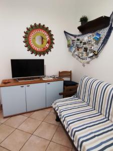 TV a/nebo společenská místnost v ubytování Casa Giosa