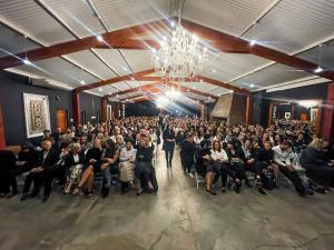 a large crowd of people sitting in a room at Upington African Vineyard Boutique Hotel & SPA in Kanoneiland +161 photos