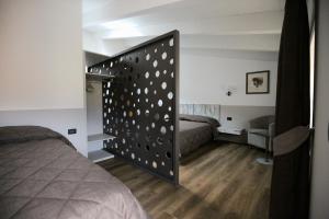 Voodi või voodid majutusasutuse Albergo Antica Locanda toas