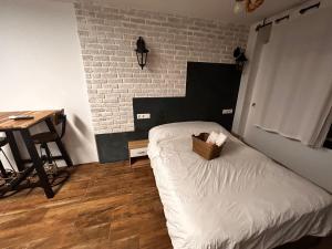 Katil atau katil-katil dalam bilik di Beach, City & Gibraltar: Small Studio
