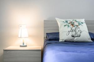 Postel nebo postele na pokoji v ubytování T12- Bilocale Free WiFi vicino a Bologna Fiera, Ravenna, Lugo Hospital Villa Maria