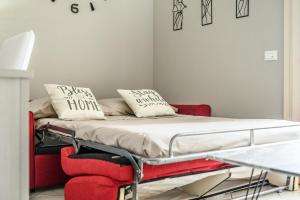 Postel nebo postele na pokoji v ubytování T12- Bilocale Free WiFi vicino a Bologna Fiera, Ravenna, Lugo Hospital Villa Maria