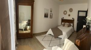 Ένα ή περισσότερα κρεβάτια σε δωμάτιο στο Appartement chaleureux