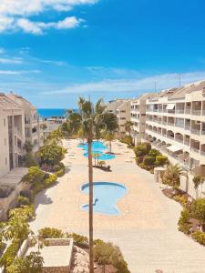 an aerial view of the pool at the resort at Palm Mar Penthouse Duplex in Palm-mar