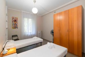 Letto o letti in una camera di NEW! Apt x4 a 1km from Don Bosco Bus Station!