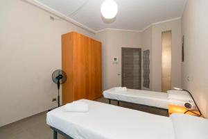 Letto o letti in una camera di NEW! Apt x4 a 1km from Don Bosco Bus Station!