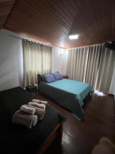 Postel nebo postele na pokoji v ubytování Casa.dovale2