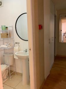 a bathroom with a sink and a mirror at 807. Departamento entero en Chorrillos in Lima