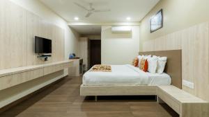 Monk's Nirvanaa Hotel & Resort客房内的一张或多张床位