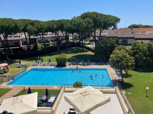 Bazén v ubytování Marina Residence 9- Appartamento Santa Severa nebo v jeho okolí + 12 fotografií
