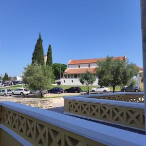 a view from a balcony of a parking lot at Casa Santa Maria - Tomar in Tomar