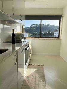 Kuchyň nebo kuchyňský kout v ubytování Rio Coração