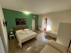 Postel nebo postele na pokoji v ubytování B&B Casa Doria