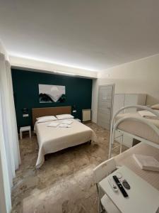 Postel nebo postele na pokoji v ubytování B&B Casa Doria