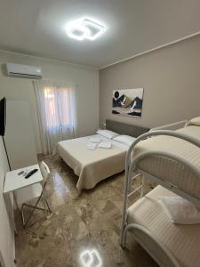 Postel nebo postele na pokoji v ubytování B&B Casa Doria