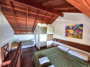 Cama ou camas em um quarto em Apart Hotel Beira do Mar