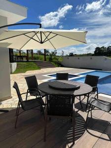 Bazén v ubytování Chácara em Socorro SP nebo v jeho okolí