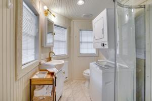 a bathroom with a toilet and a sink and a shower at Idyllic Camden Hideaway 1 Mi to Kentucky Lake in New Johnsonville