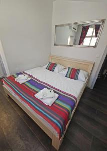 Posteľ alebo postele v izbe v ubytovaní Historic Centre Residence