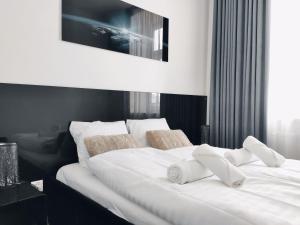 Posteľ alebo postele v izbe v ubytovaní Szeroka 33 A-C by Homeprime