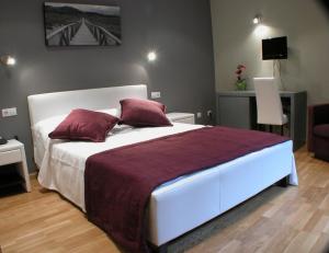 Voodi või voodid majutusasutuse Hotel Portal Del Matarraña toas