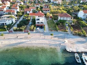 an aerial view of a small island in the water at Villa Luce in Vinišće
