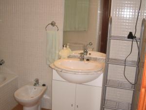 a bathroom with a sink and a toilet at 0318 Studio in Torremolinos 800 m from the beach in Torremolinos