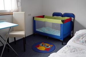 Katil atau katil-katil dalam bilik di Hotel Faxe Schwarzwälder Hof
