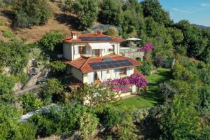 an aerial view of a house with solar panels on its roof at Villa Romantica Sea View in Camaiore