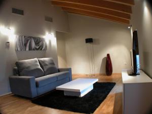 A seating area at Hotel Portal Del Matarraña