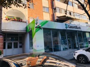 a car parked in front of a building at Apartament Diana in Tulcea