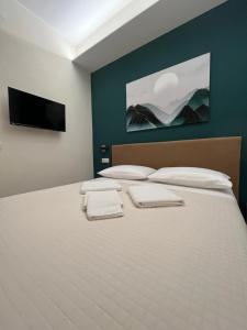 Postel nebo postele na pokoji v ubytování B&B Casa Doria