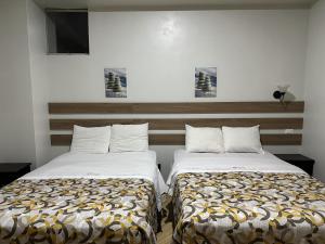 Cama o camas de una habitación en Hotel Remanso