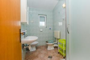 Kúpeľňa v ubytovaní Apartments Vinceljak + 5 fotografií