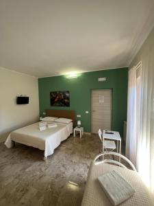 Postel nebo postele na pokoji v ubytování B&B Casa Doria