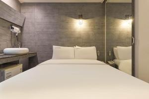 Koupelna v ubytování HERTZ Hotel