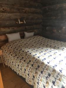 Кровать или кровати в номере Ruka Kuukkeli, one bedroom + loft