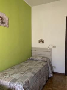 A bed or beds in a room at CASA FEDERICA